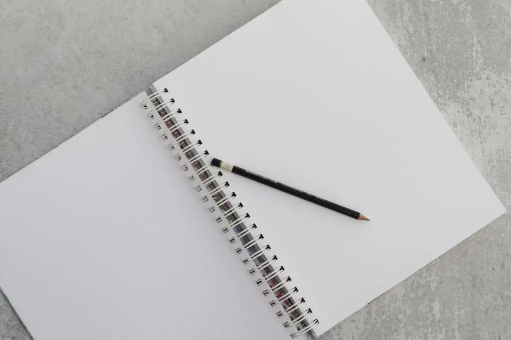 unsplash_4XOuAqQSj-Y_spiral notebook.webp